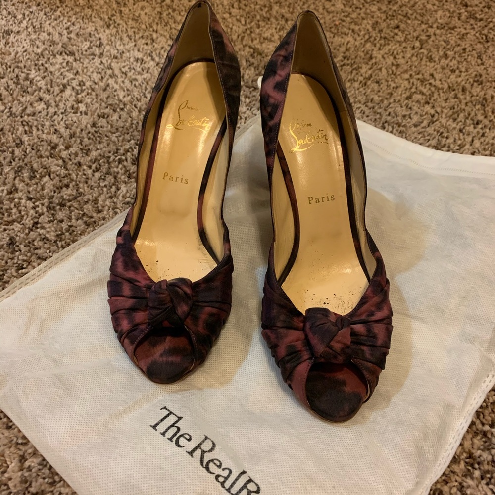 Louboutin purple leopard pumps
